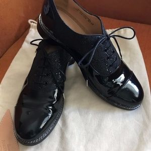Office of Angela Scott black patent leather oxford